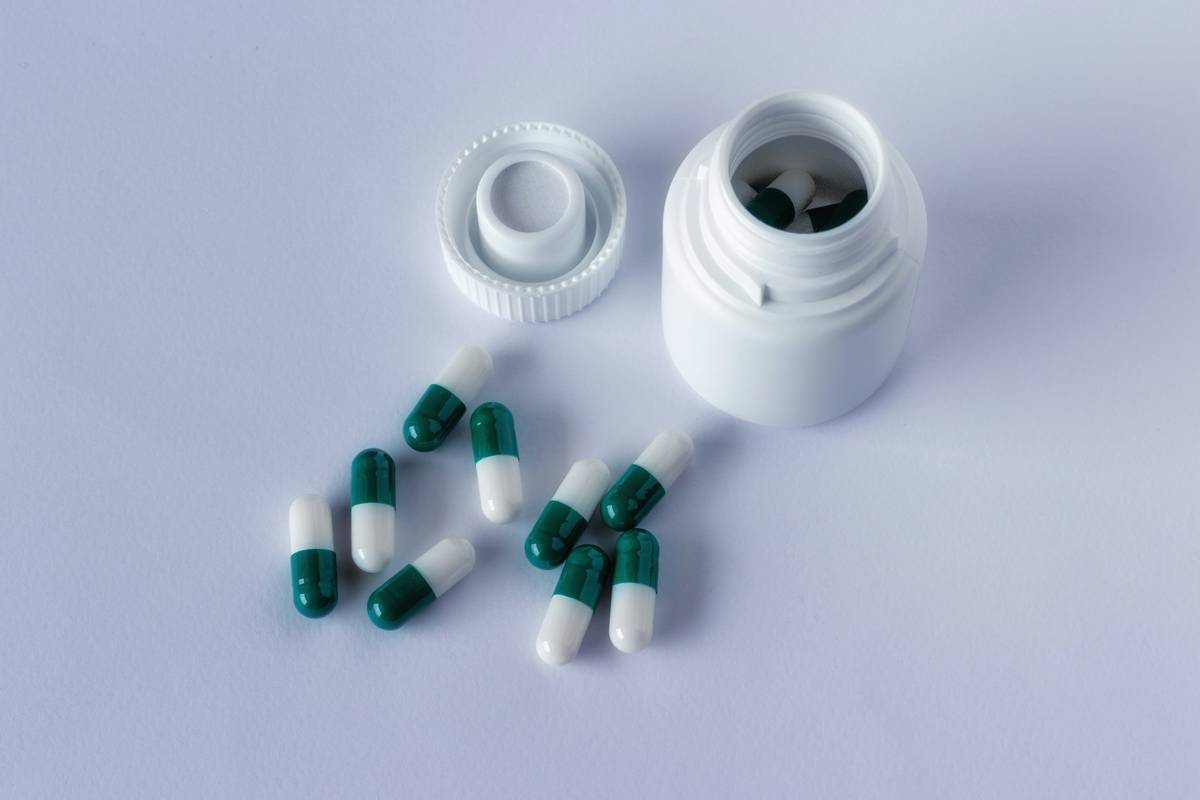 man taking prostate supreme supplement for men with healthy high-fat meal